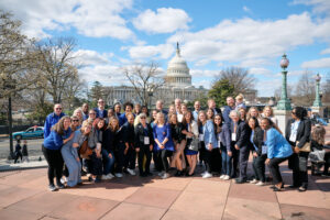 group of advocates in front of the capital building in Washington, DC